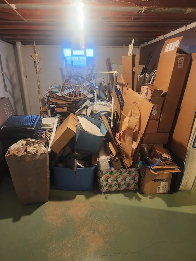 Roll-off dumpster container at job site for Roll Off Dumpster Rental in Mason City